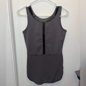 Size 4 LuluLemon tank with slits on sides and mesh detailing on front